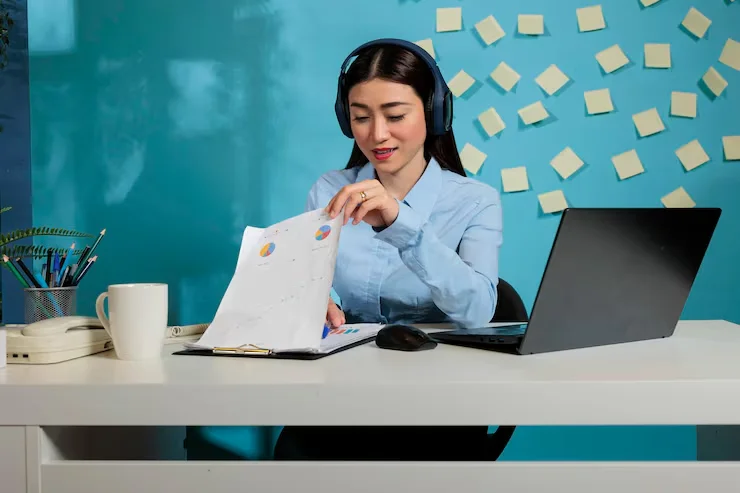 Assistant reviewing documents