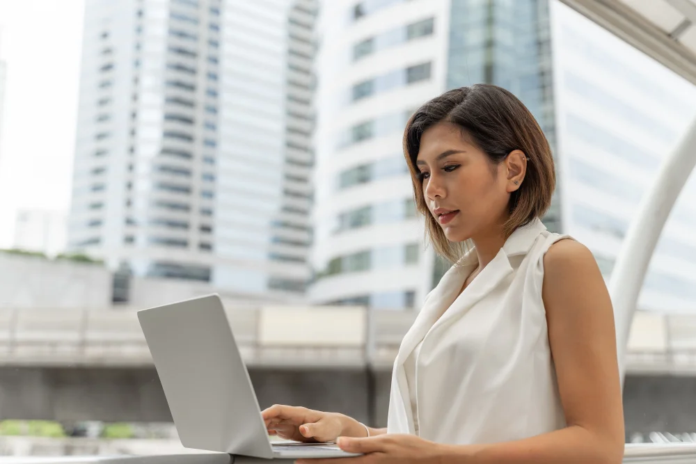 Remote operations professional managing calendar coordination and business reporting from a flexible workspace